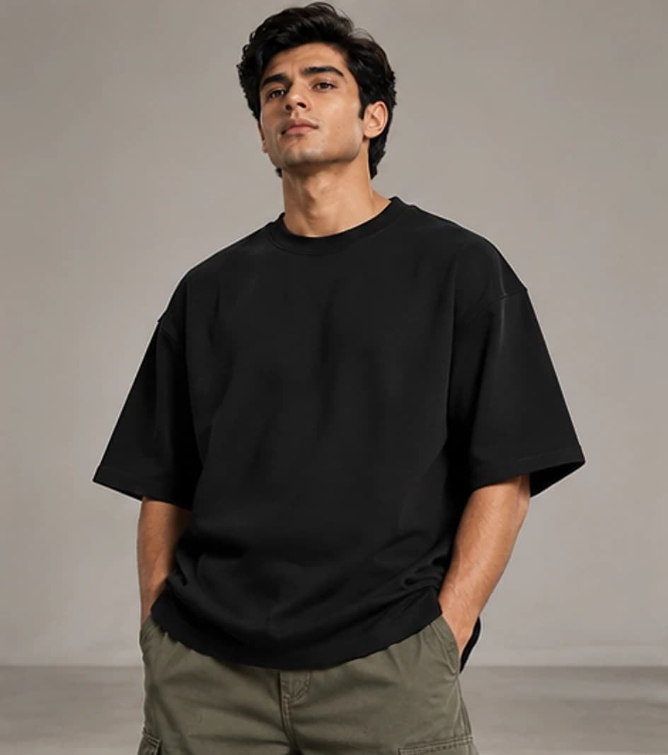 Drop-shoulder oversized tee with relaxed shoulder seams on model